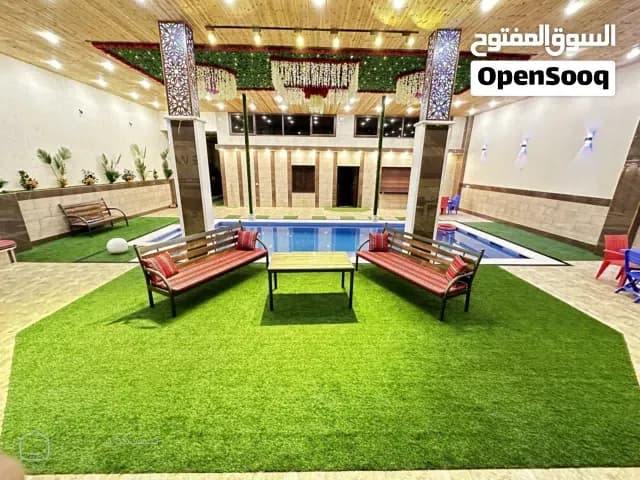 مزرعة ريفان المغلقة بالكامل للايجار  مسبح مغلق و مدفى خصوصية عالية مكان خاص للشواء مكان خاص للاطفال — مزرعة في الزرقاء
